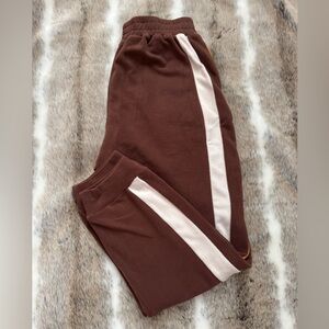 NWOT Easel Brown Track Pants with Orange and White Stripes Size Small.
